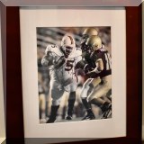 C49. Autographed football photo. 